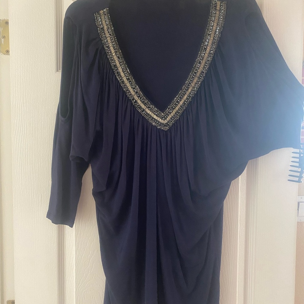 Elegant Navy Women's Top with Embellished Neckline